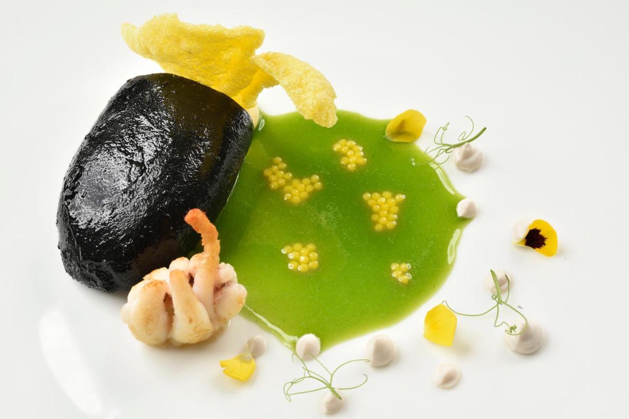 Swiss Diamond Hotel & Spa Morcote Exterior foto A dish by chef Massimo Botta